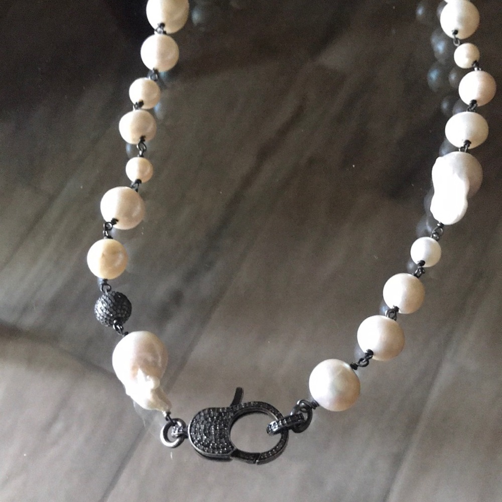 Baroque Pearl with sterling Silver Diamond clasp.